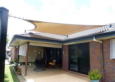 Shade sail over patio area - Z16 Desert Sand with black